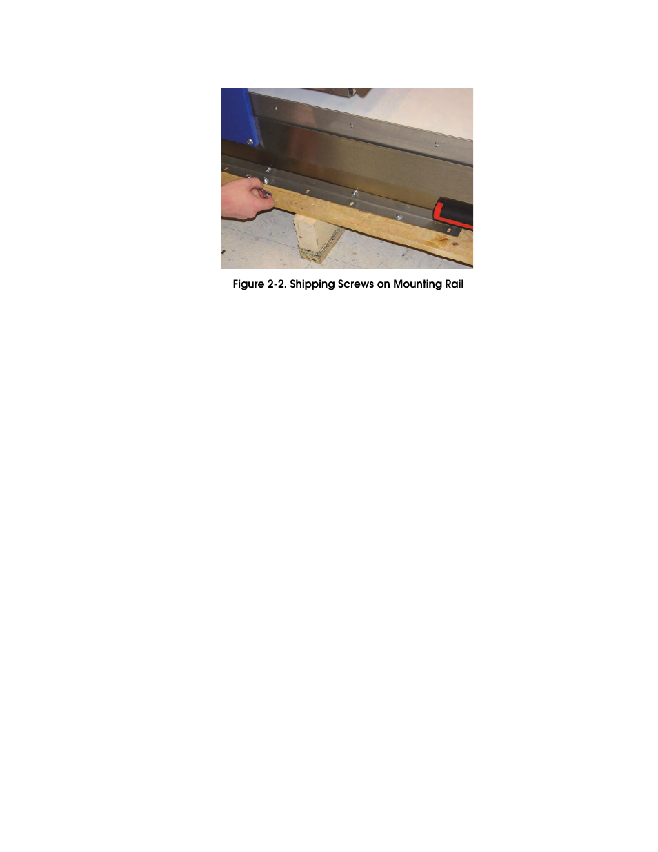 Figure 2-2. shipping screws on mounting rail | Adept AnyFeeder User Manual | Page 21 / 68