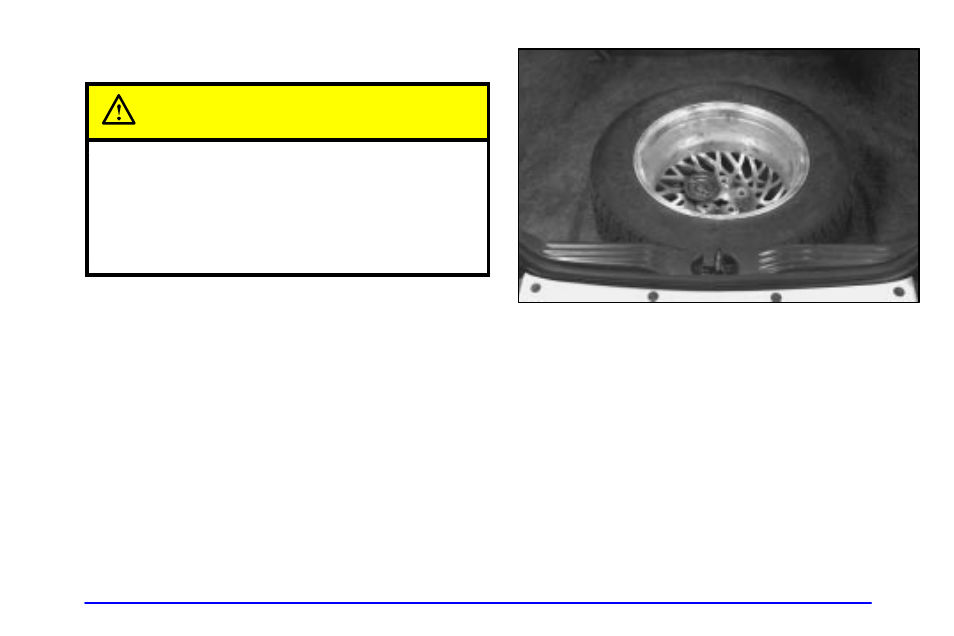 Storing the flat tire and tools, Caution | Pontiac Grand Prix 2001 User Manual | Page 259 / 373