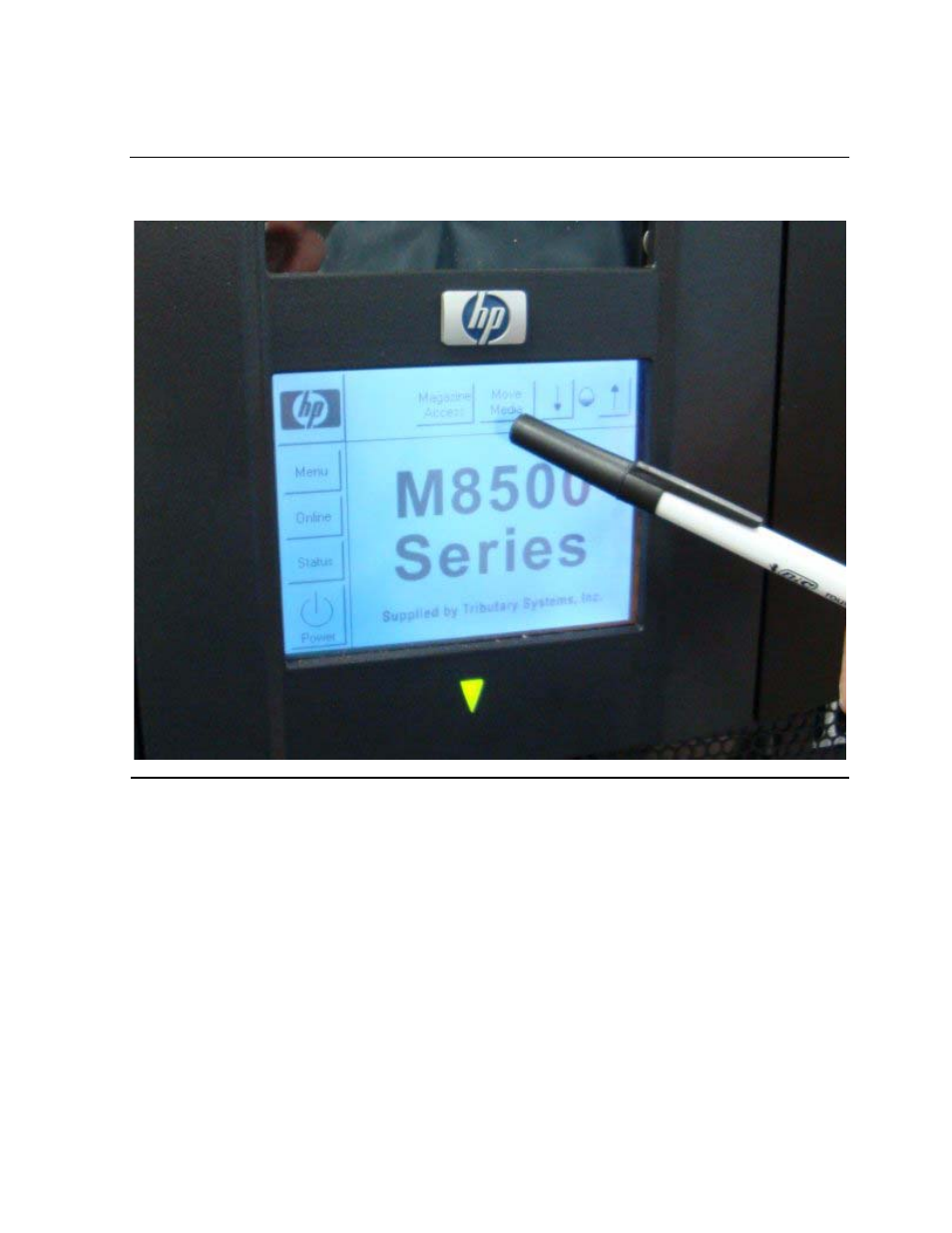Figure 5-4, Pressing the move media button | HP Integrity NonStop H-Series User Manual | Page 52 / 88