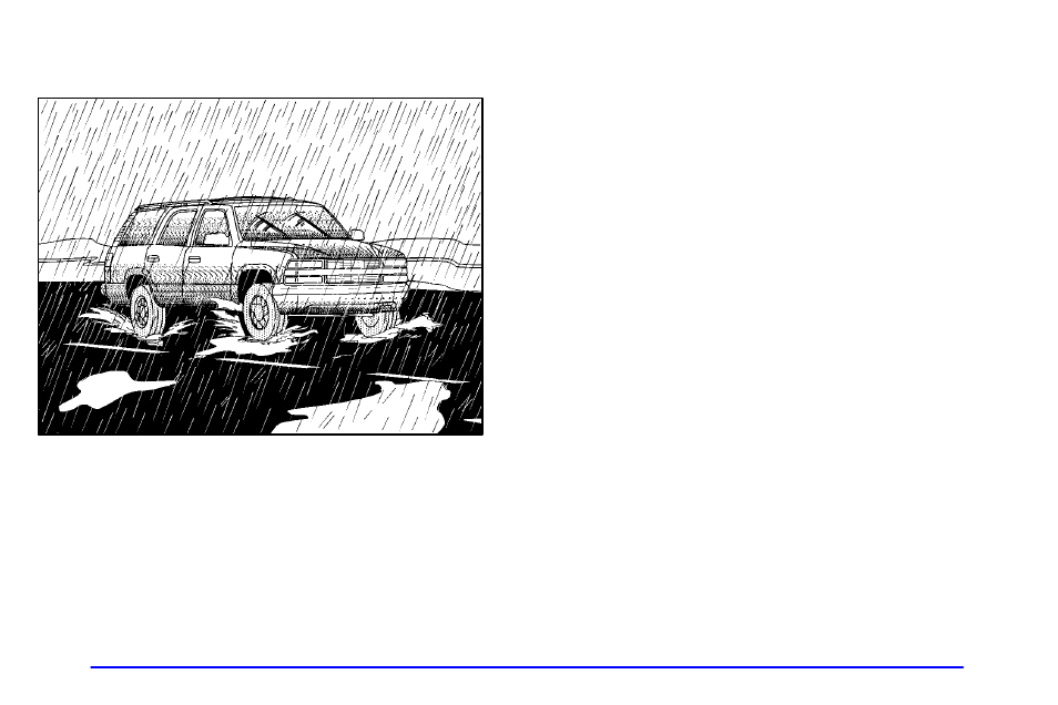 Driving in rain and on wet roads | GMC 2002 Envoy User Manual | Page 256 / 422